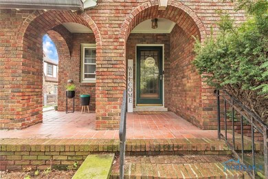 Gorgeous, welcoming arched entry.