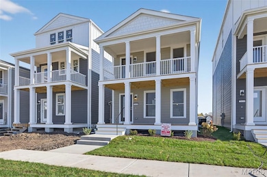 View of front of home with a porch + James Hardie siding