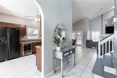 Foyer looking in to kitchen and family room