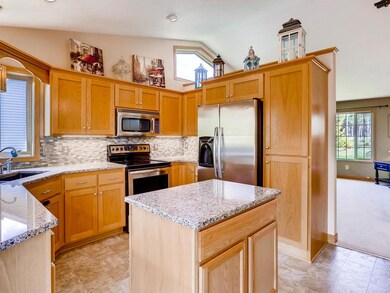 Updated kitchen with gleaming granite