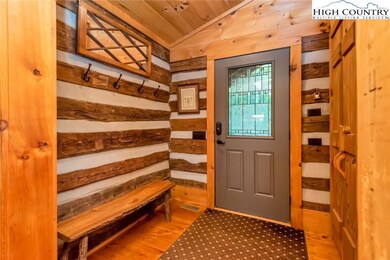 Welcome to your mountain getaway! Entryway with coat closet and room to take off your hiking shoes.