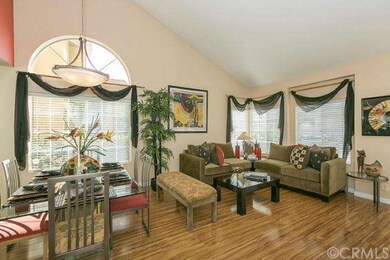 Another view of the living room and formal dining 