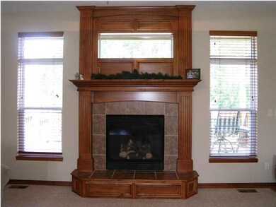 The gas fireplace is a focal for the living room a