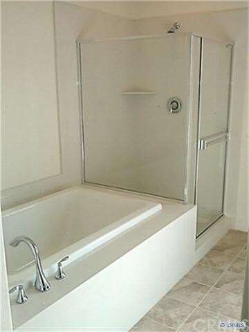Separate tub & shower at master bath