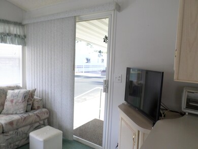 LIVING ROOM SLIDERS TO FRONT ENTRY