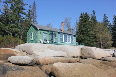 Looking at the cottage from the ledges
