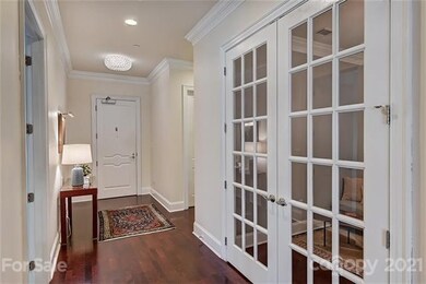 Entry Hall. Double doors lead to the study.