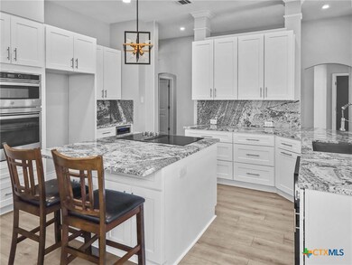As you enter, make this beautifully remodeled kitc
