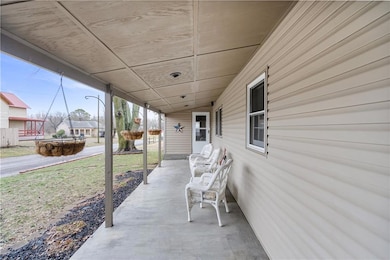 View of patio featuring a porch