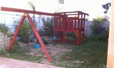 SIDE YARD WITH SWING SET