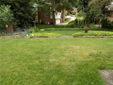 Terraced backyard with garden and low maintenance 