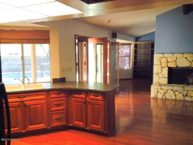 view of family room, backyard and office