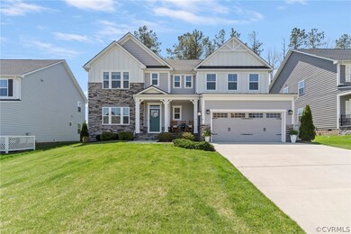 This 4 bedroom 2.5 bath craftsman style home is si