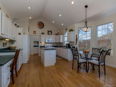 Very functional kitchen with several work spaces a