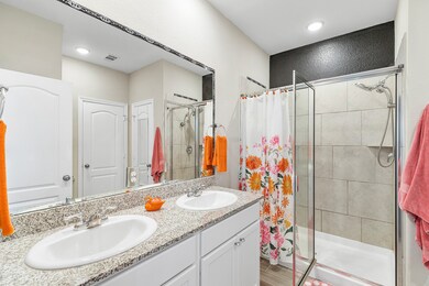 double sink with walk in shower.