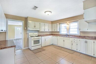 open kitchen with tons of cabinets