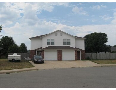 Exterior Front. Great, long-term tenants live on the left side. The right side is currently vacant.