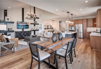 Dining area with light hardwood / wood-style floor