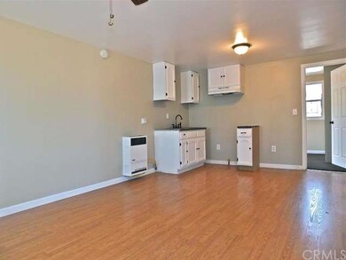 Front unit- Open floor plan kitchen with new white
