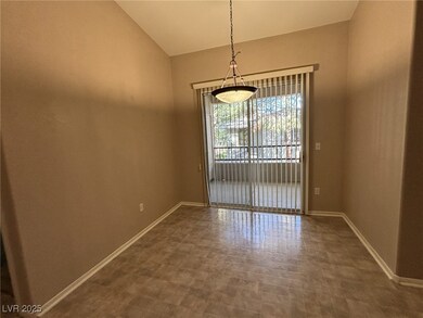 Empty room with tile patterned floors, baseboards,