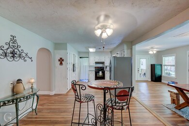 Dining area with light wood-type flooring and ceil