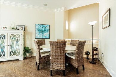 Dining room with ornamental molding, baseboards, a
