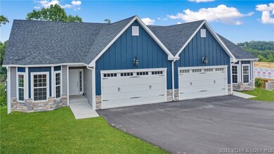 2 car garage. Easy maintenance landscaping not pic