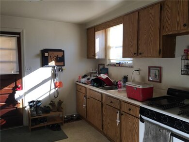 1st floor eat in kitchen with gas stove and refrig
