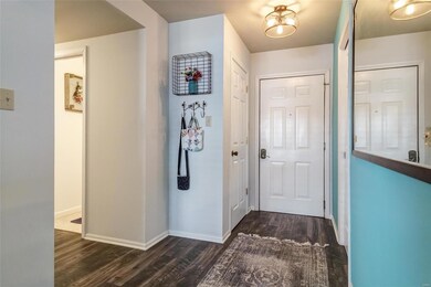 View of the foyer. On the left is a coat closet an