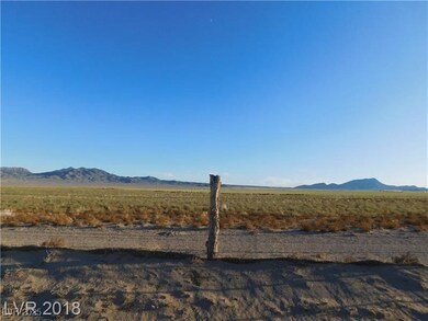 Property view of mountains with a rural view