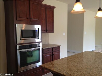 Exterior Front - Granite Countertops-Island-Microw
