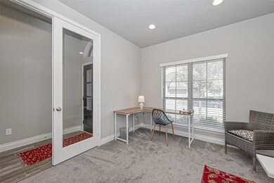 Enclosed by french doors, this
spacious study pro