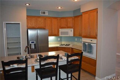 Cozy kitchen with new quartz counters, stainless s