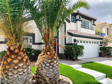 View of front of house with stucco siding, a tile