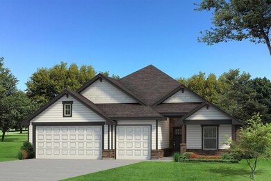View of front of property with an attached garage,