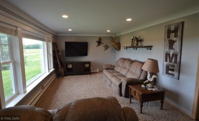 The living room faces the front yard and has a lar