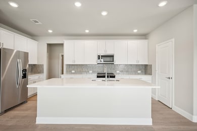 Photo is not of the actual home, but is an inspirational photo of builder’s model home and may depict options, furnishings, and/or decorator features that are not included.