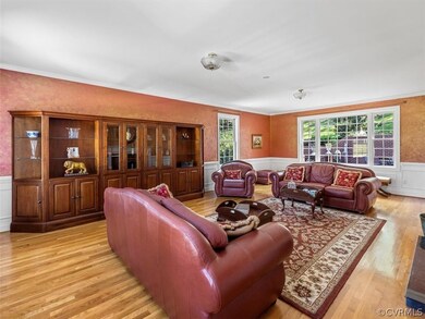 Formal living room with tons of natural light from