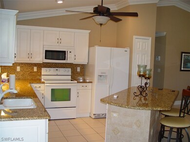 Raised Panel Cabinets with Granite
