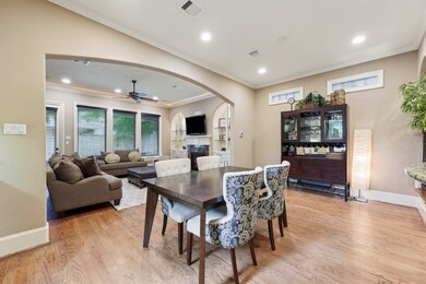 Natural light fills the living and dining space, s