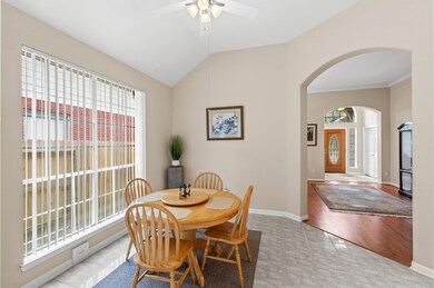 The kitchen eating area. Featuring huge windows al