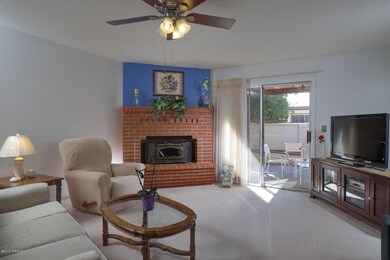 Fireplace has wood burning insert