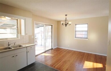 Large dining area with newly refinished floors