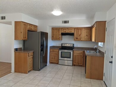 Lots of cabinet space in kitchen.
