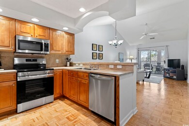 Kitchen featuring stainless steel appliances, ligh