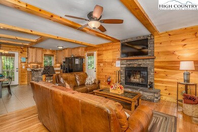 Cozy mountain style cabin with stone fireplace