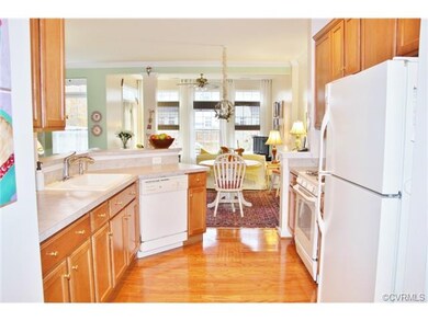 Immaculately maintained kitchen with plenty of storage space, beautiful floors, and well kept appliances.