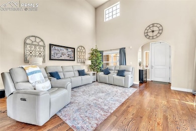 Vaulted ceilings and lots of light coming through the high transom windows