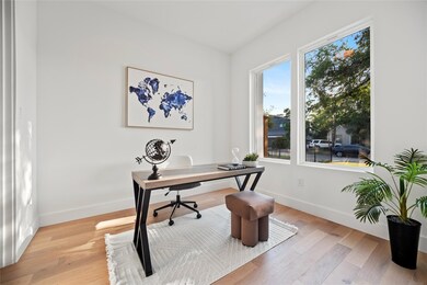 Home office featuring light hardwood / wood-style 
