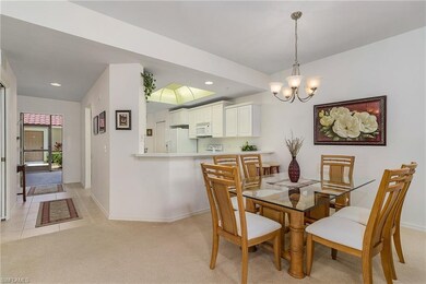 Kitchen opens to large dining area.
